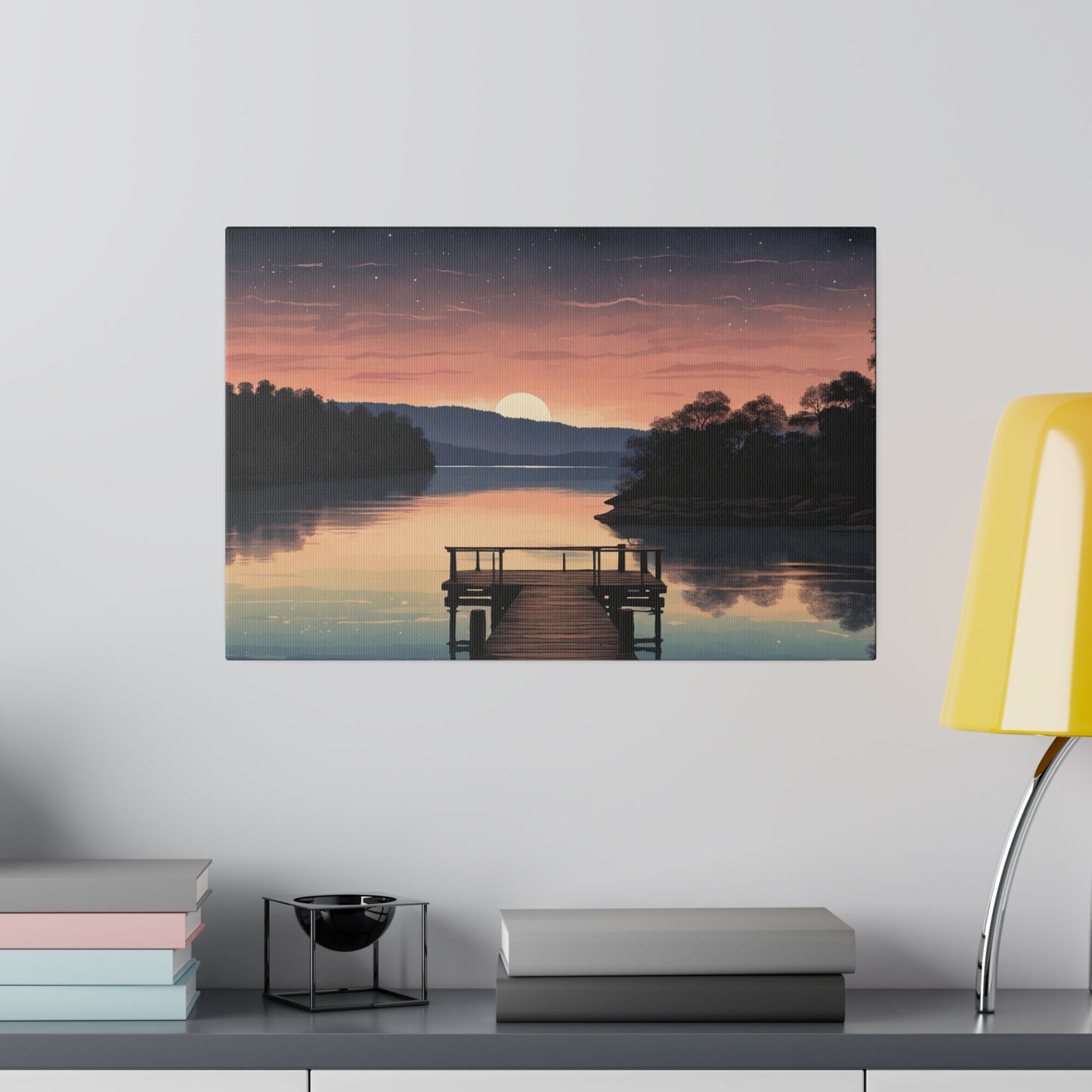 A serene sunset casts warm hues over a smooth lake, with a wooden dock leading into the still water. Stars begin to pepper the dusk sky as the final slice of the sun dips behind a distant tree-lined horizon. Tranquil Serenity Lake Canvas Print