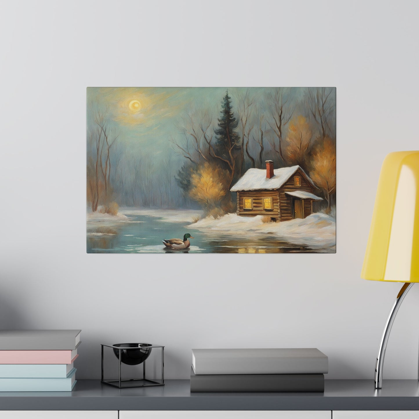 Invite the warmth and tranquility of a winter wonderland into your home with this Cozy Old Cabin in the Woods Wall Art Print. This enchanting artwork captures the serene beauty of a snow-covered landscape, where a warmly lit cabin nestles among trees beside a tranquil pond, evoking a sense of peace and comfort.