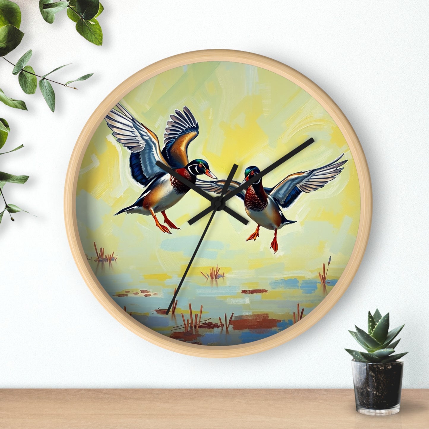 This collection of waterfowl art wall clocks brings the beauty of wetlands into your space, each clock featuring a meticulously crafted scene of waterfowl in natural settings.