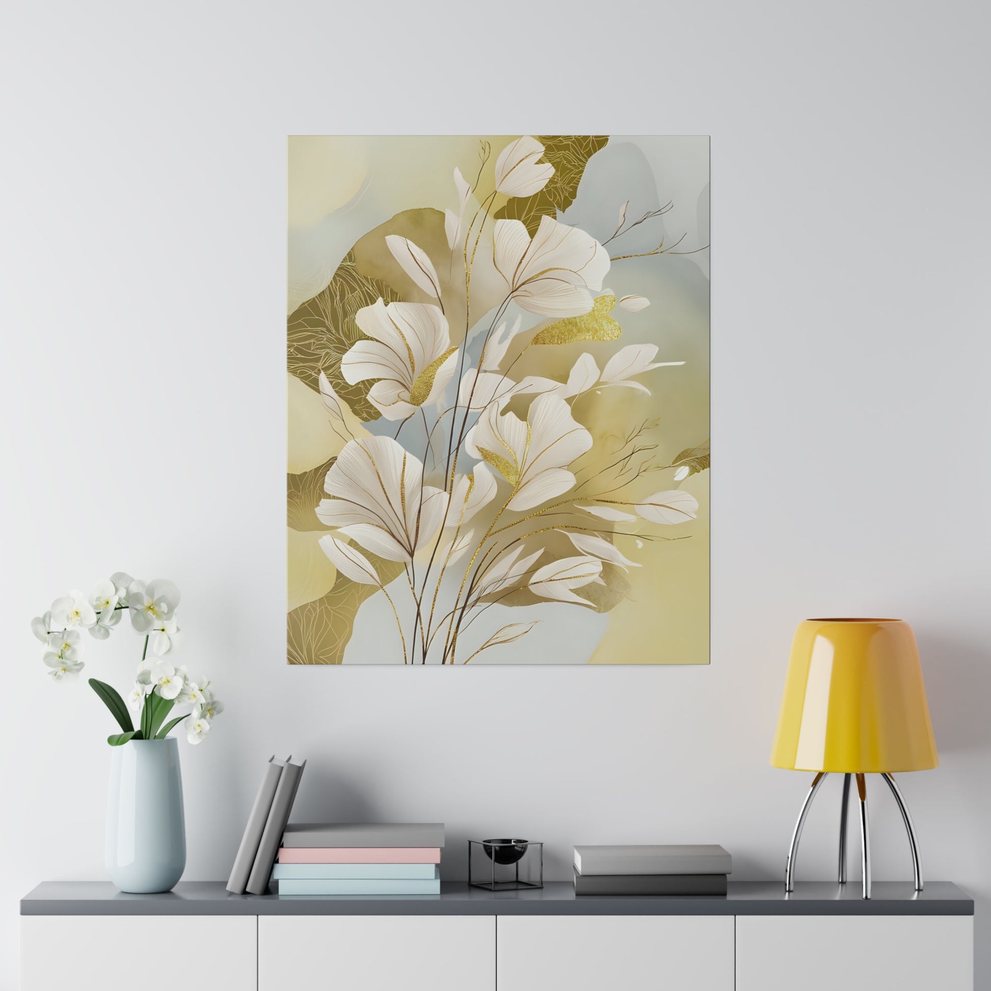 Delicate white flowers with golden accents stand against a soft, abstract background of earthy tones and gentle blues. Thin branches intermingle with the graceful petals, evoking a sense of peaceful elegance.