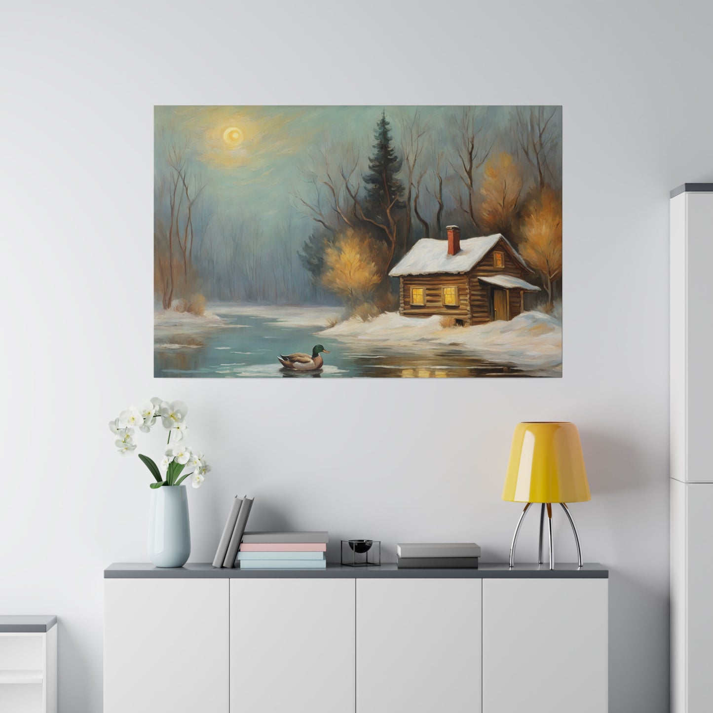 Invite the warmth and tranquility of a winter wonderland into your home with this Cozy Old Cabin in the Woods Wall Art Print. This enchanting artwork captures the serene beauty of a snow-covered landscape, where a warmly lit cabin nestles among trees beside a tranquil pond, evoking a sense of peace and comfort.